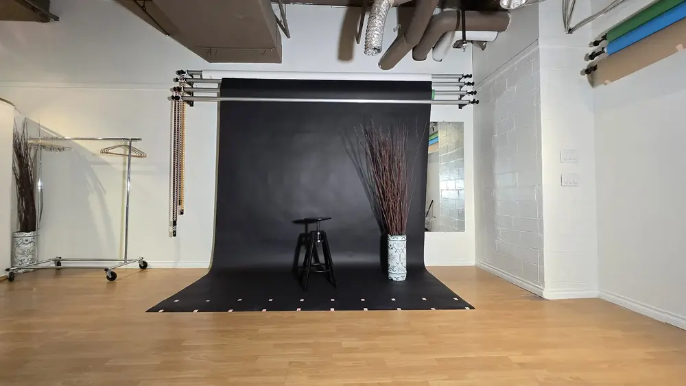 Black backdrop setup for professional headshots and portrait photography at The Vancouver Studio